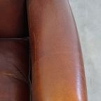 Vintage Karaktervolle Fauteuil Gemaakt Van Schapenleer Met Een Prachtige Warme Kleurstelling thumbnail 9