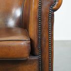 Cognac-Kleurige En Comfortabele Vintage Schapenleren Clubfauteuil Met Een Royale Zit thumbnail 11