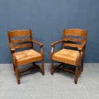 Set Van Twee Hollandse Eikenhouten Armstoelen Met Biezen Zitting thumbnail 19