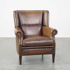 Subtiele, Comfortabele En In Goede Staat Verkerende Donkere Schapenleren Fauteuil Met Een Correct thumbnail 2