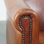 Comfortabele Cognac-kleurige Engelse Rundleren Clubfauteuil Met Een Afwerking Met Siernagels thumbnail 11