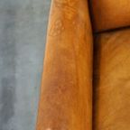 Unieke Rundleren Oorfauteuil Met Houten Details thumbnail 8