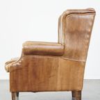 Sierlijke, Stijlvolle, Tijdloze En Comfortabele Oorfauteuil Gemaakt Van Rundleer In Engelse Stijl thumbnail 6