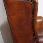 Grote, Royale Schapenleren Oorfauteuil Met Warme Kleuren En Een Prachtig Patina thumbnail 16