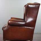 Luxe Grote Schapenleren Oorfauteuil Met Prachtige Kleuren En Geweldig Patina thumbnail 6