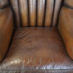 Subtiele, Prachtig Gekleurde Schapenleren Fauteuil Met Een Uniek Design Afgewerkt Met Siernagels thumbnail 7