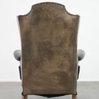 Grote Antieke Zwarte Engelse Rundleren Oorfauteuil Uit Eind 19e Eeuw Met Een Luxe Uitstraling thumbnail 5