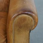 Stijlvolle Gepatineerde Vintage Schapenleren Fauteuil Met Een Comfortabele Zit thumbnail 11