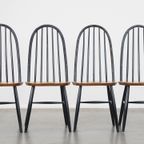 Set Van 4 Vintage Houten Design Stoelen Met Zwarte Spijlen Rugleuning En Bruine Zitting thumbnail 3