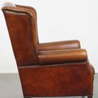 Grote, Royale Schapenleren Oorfauteuil Met Warme Kleuren En Een Prachtig Patina thumbnail 4
