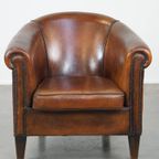 Cognac-kleurige En Comfortabele Vintage Schapenleren Clubfauteuil Met Een Royale Zit thumbnail 13