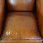 Zeer Mooie Schapenleren Fauteuil Met Een Luxe Vormgeving En Hout Gesneden Poten thumbnail 7