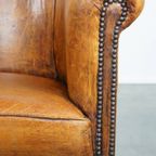 Subtiele, Cognac-kleurige Schapenleren Clubfauteuil Met Een Tijdloos Design En Correct Afgewerkt thumbnail 10