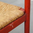 Leuke Rode Vintage Houten Jaren ’70 Stoel Met Een Gevlochten Rieten Zitting thumbnail 8
