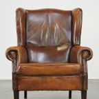 Stoere Schapenleren Oorfauteuil Met Vast Zitkussen En Mooie Warme Cognac Kleuren thumbnail 3