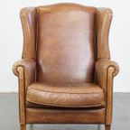 Charmante, Tijdloze En Karaktervolle Rundleren Oorfauteuil In Een Lichte Cognac Kleur thumbnail 2