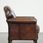 Karaktervolle Fauteuil Gemaakt Van Schapenleer Met Een Geweldig Patina En Goed Zitcomfort thumbnail 4