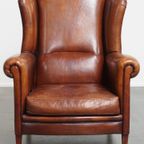 Grote Karaktervolle En Tijdloze Schapenleren Oorfauteuil Met Een Luxe Afwerking thumbnail 13