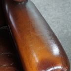 Luxe Grote Schapenleren Oorfauteuil Met Prachtige Kleuren En Geweldig Patina thumbnail 9