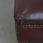 Stoere Vintage Hocker Gemaakt Van Schapenleer thumbnail 9