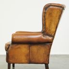 Stoere Schapenleren Oorfauteuil Met Vast Zitkussen En Mooie Warme Cognac Kleuren thumbnail 6