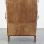 Charmante, Tijdloze En Karaktervolle Rundleren Oorfauteuil In Een Lichte Cognac Kleur thumbnail 4