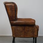 Comfortabele Schapenleren Oorfauteuil Met Een Prachtige Vintage Uitstraling thumbnail 4