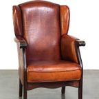 Klassieke Vintage Schapenleren Oorfauteuil Met Mooie Afwerking En Warme Kleuren thumbnail 2