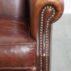 Vintage Karaktervolle Fauteuil Gemaakt Van Schapenleer Met Een Prachtige Warme Kleurstelling thumbnail 10
