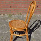 Rotan Stoeltje Met Pauwenstaart Waaier Boog thumbnail 3