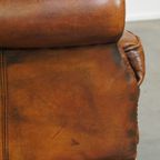 Stoere Schapenleren Oorfauteuil Met Vast Zitkussen En Mooie Warme Cognac Kleuren thumbnail 12