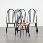 Set Van 4 Vintage Houten Design Stoelen Met Zwarte Spijlen Rugleuning En Bruine Zitting thumbnail 2