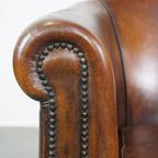 Cognac-Kleurige En Comfortabele Vintage Schapenleren Clubfauteuil Met Een Royale Zit thumbnail 10