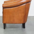 Zeer Comfortabele Cognac Kleurige Clubfauteuil Gemaakt Van Schapenleer En Strak Afgewerkt Met Zwa thumbnail 6