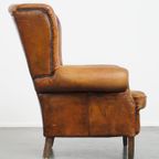 Comfortabele Vintage Oorfauteuil Gemaakt Van Karakteristiek Schapenleer thumbnail 2