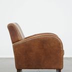 Comfortabele Cognac-Kleurige Rundleren Armchair Met Een Strak Design thumbnail 4