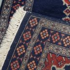Subtiel Vloerkleed Met Voornamelijk Donkerblauw Gemaakt Van Wol 139x66cm thumbnail 7