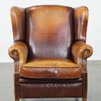 Karakteristieke En Tijdloze Vintage Schapenleren Oorfauteuil Met Mooie Kleuren thumbnail 3