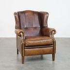 Comfortabele Vintage Schapenleren Oorfauteuil Met Een Tijdloos Design En Een Strakke Afwerking thumbnail 2