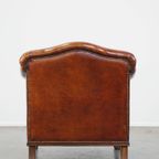 Zeer Mooie Schapenleren Fauteuil Met Een Luxe Vormgeving En Hout Gesneden Poten thumbnail 5