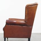 Grote En Luxe Schapenleren Oorfauteuil Met Een Prachtige Warme Kleurstelling thumbnail 5