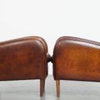 Karaktervolle Set Van 2 Schapenleren Fauteuils/ Armchairs Met Een Mooi Patina En Warme Kleuren thumbnail 6