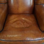 Sierlijke Schapenleren Oorfauteuil Met Zwarte Biezen En Klassieke Vormen thumbnail 6