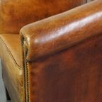 Comfortabele Vintage Schapenleren Clubfauteuil Met Een Vast Zitkussen thumbnail 12