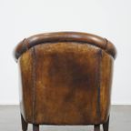 Cognac-Kleurige En Comfortabele Vintage Schapenleren Clubfauteuil Met Een Royale Zit thumbnail 5