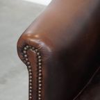 Elegante En Comfortabele Rundleren Clubfauteuil In Engelse Stijl In Een Mooie Donkere Kleur thumbnail 11