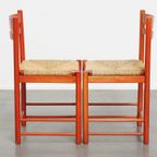 Leuke Set Van 2 Rode Vintage Houten Stoelen Uit De Jaren ’70 Met Een Gevlochten Rieten Zitting thumbnail 2
