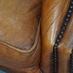 Charmante En Comfortabele Schapenleren Clubfauteuil Met Prachtige Kleuren thumbnail 13