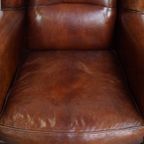 Grote Karaktervolle En Tijdloze Schapenleren Oorfauteuil Met Een Luxe Afwerking thumbnail 9