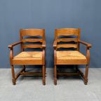 Set Van Twee Hollandse Eikenhouten Armstoelen Met Biezen Zitting thumbnail 2